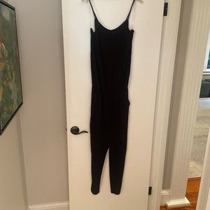 Black romper cinched at waist with drawstring